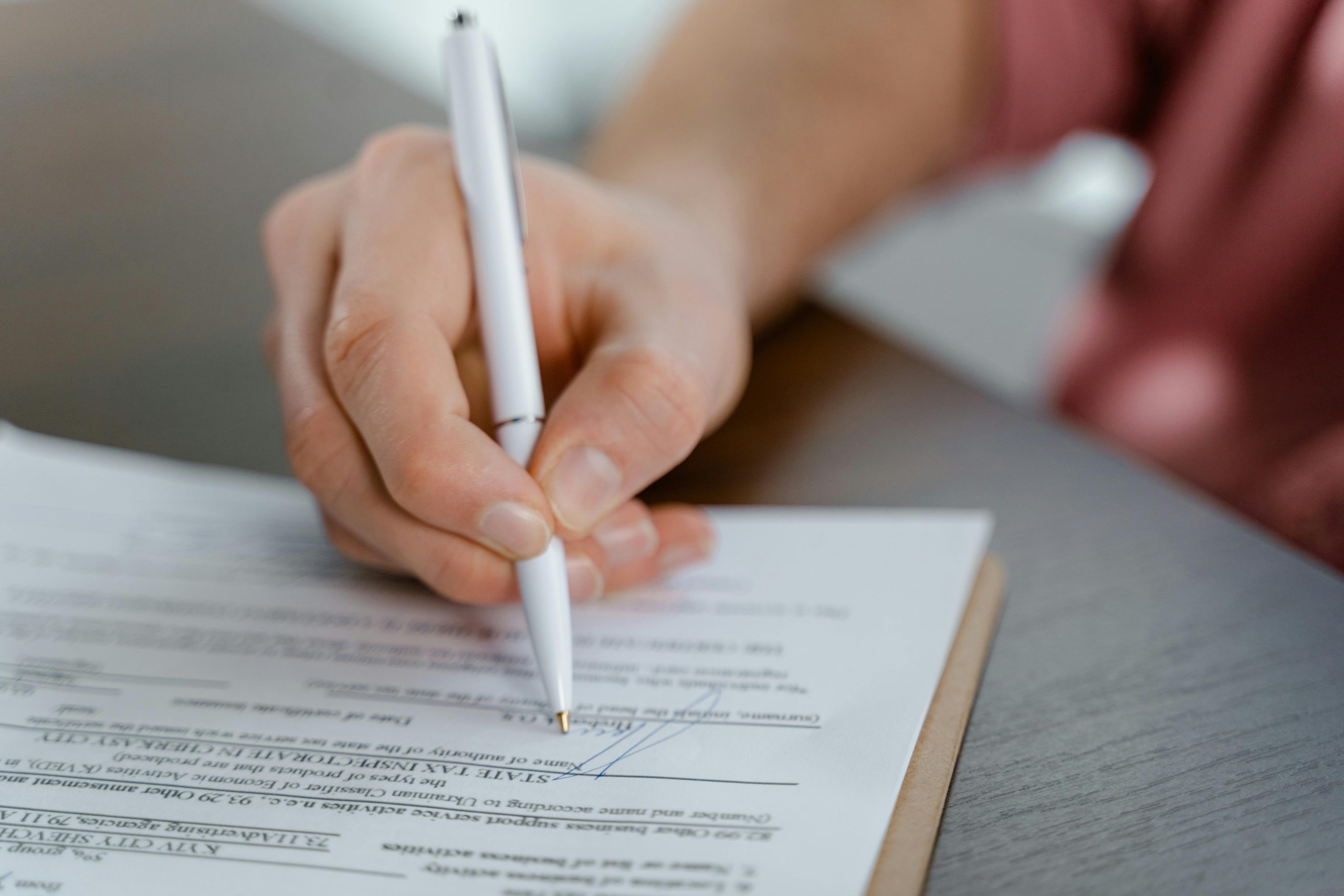 Business owners reviewing financial documents before a sale