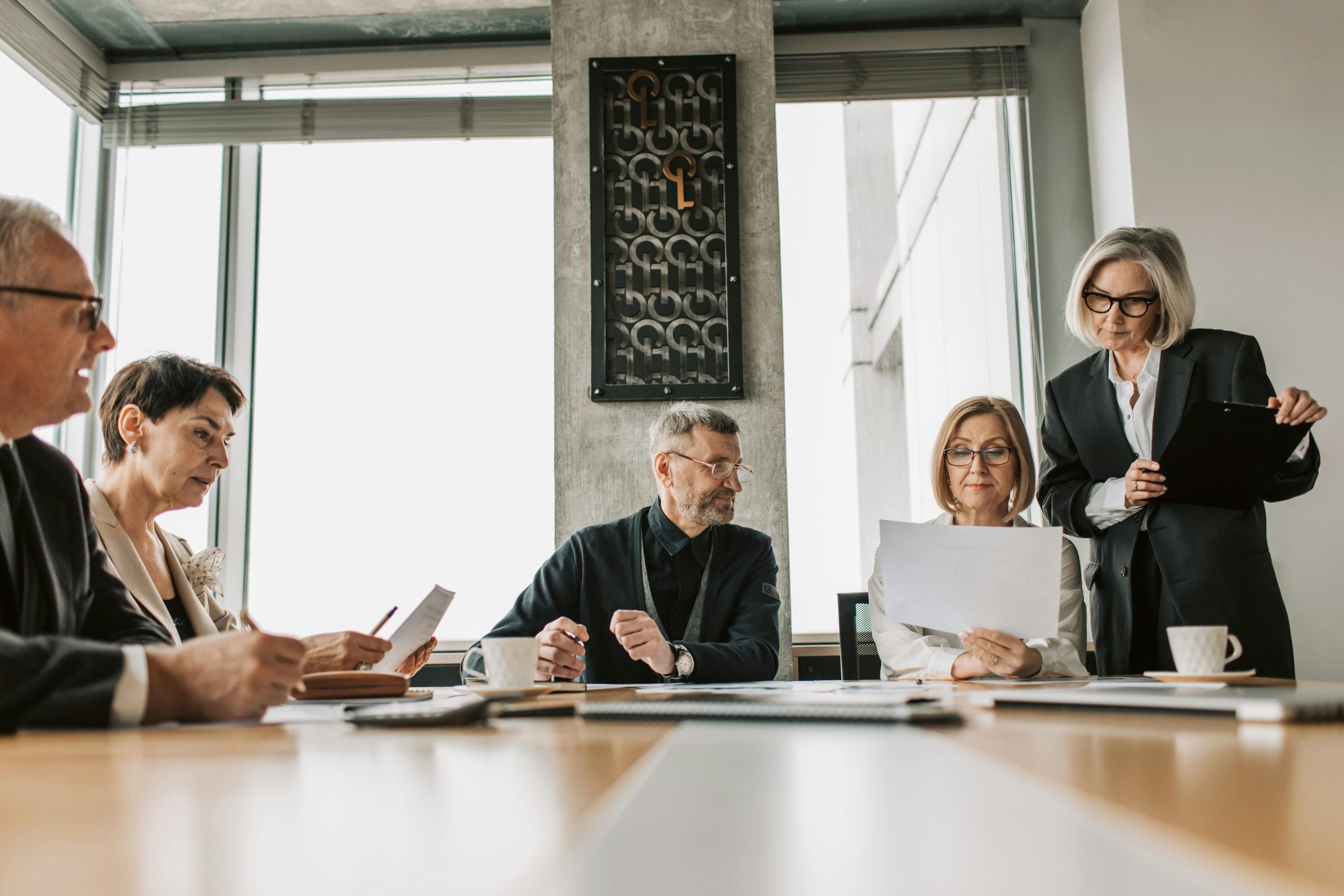 Corporate team reviewing business performance data
